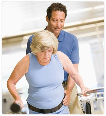 physical therapist treating woman