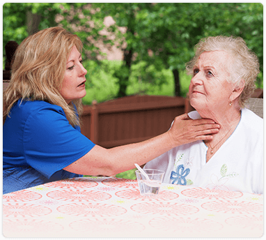 Speech Pathologists  treating older woman